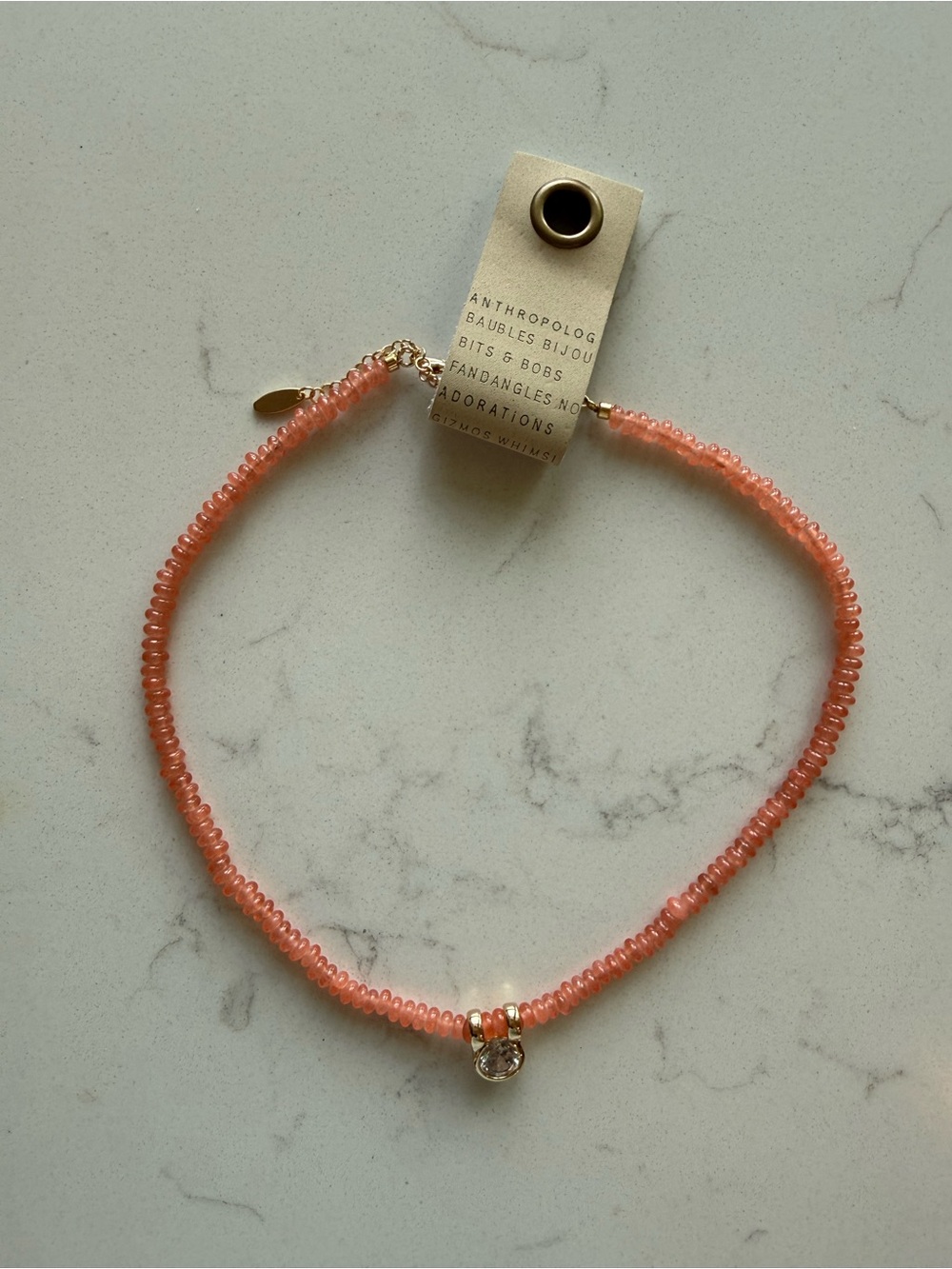 Anthropologie Peach Beaded Necklace with Gold Accent and Crystal Charm